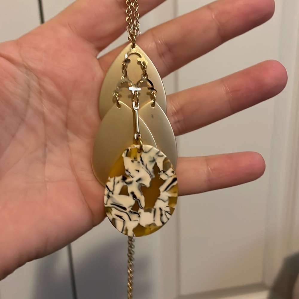Long gold necklace